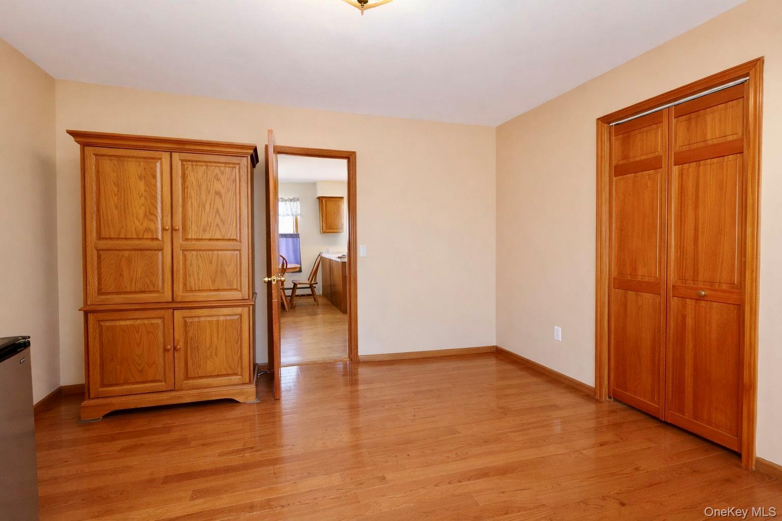 20 Day Road Campbell Hall, NY 10916 - Photo 20 of 41 an empty room with wooden floor and closet