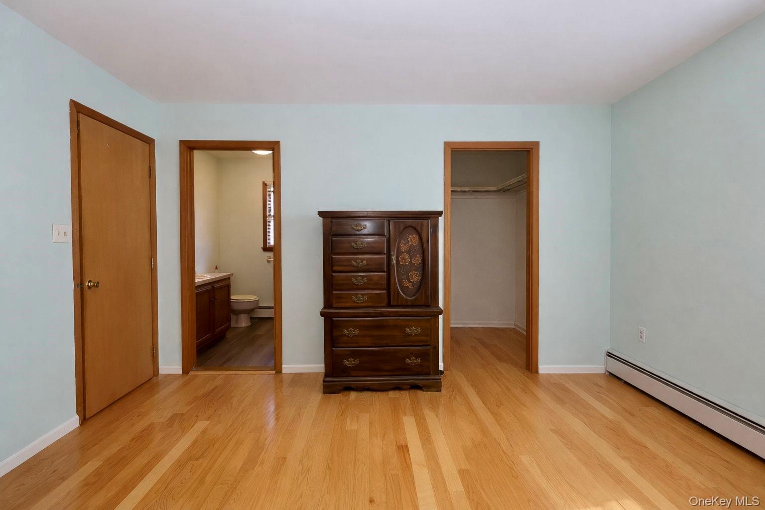 20 Day Road Campbell Hall, NY 10916 - Photo 26 of 41 a view of a hallway with wooden floor and closet