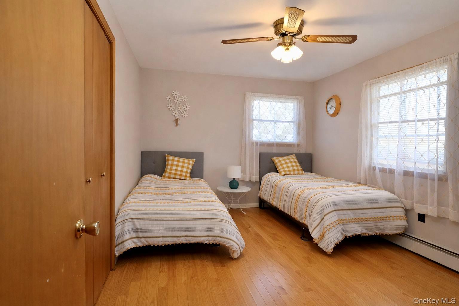 20 Day Road Campbell Hall, NY 10916 - Photo 31 of 41 a bedroom with a bed chandelier and a window