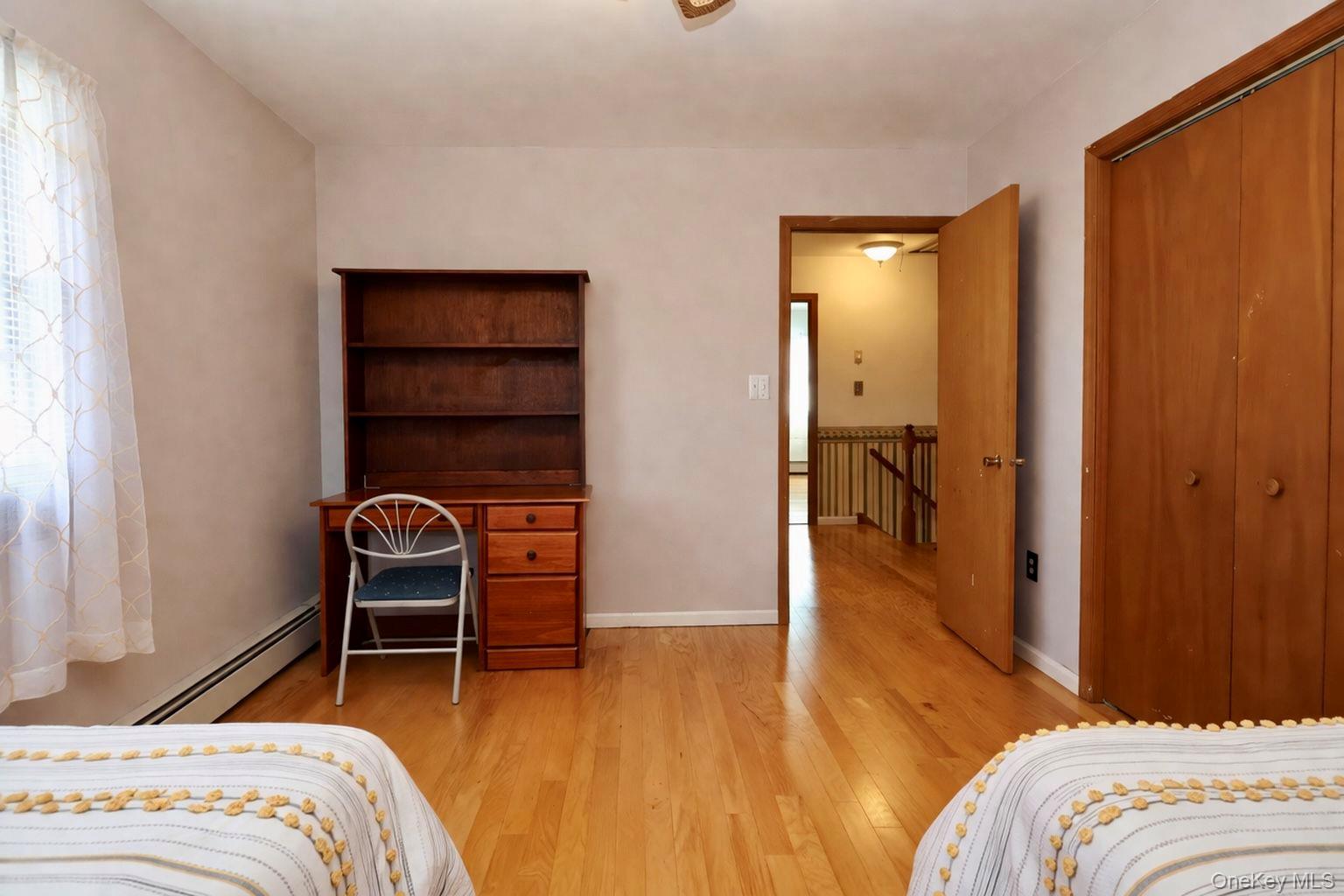20 Day Road Campbell Hall, NY 10916 - Photo 32 of 41 a bedroom with a bed and a chair