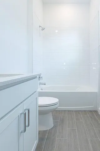 a bathroom with a sink and vanity