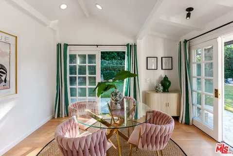 a large kitchen with stainless steel appliances granite countertop a stove and a sink