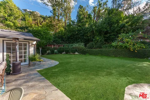 a garden view with a seating space