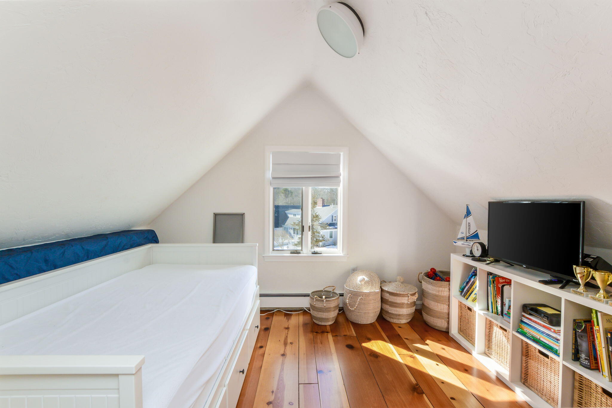 15 Marvin Circle Falmouth, MA 02540 - Photo 31 of 47 a living room with furniture and a flat screen tv