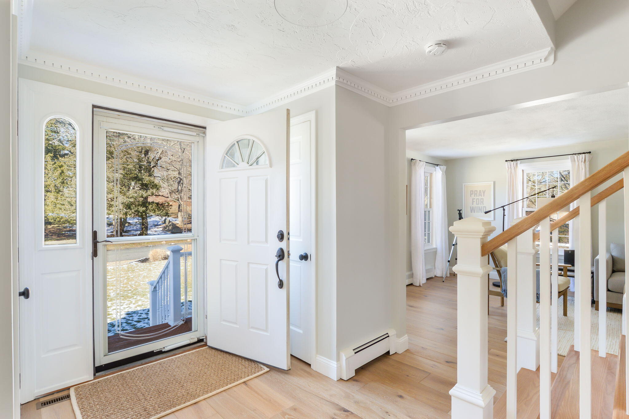 15 Marvin Circle Falmouth, MA 02540 - Photo 4 of 47 a view of an entryway with wooden floor and door
