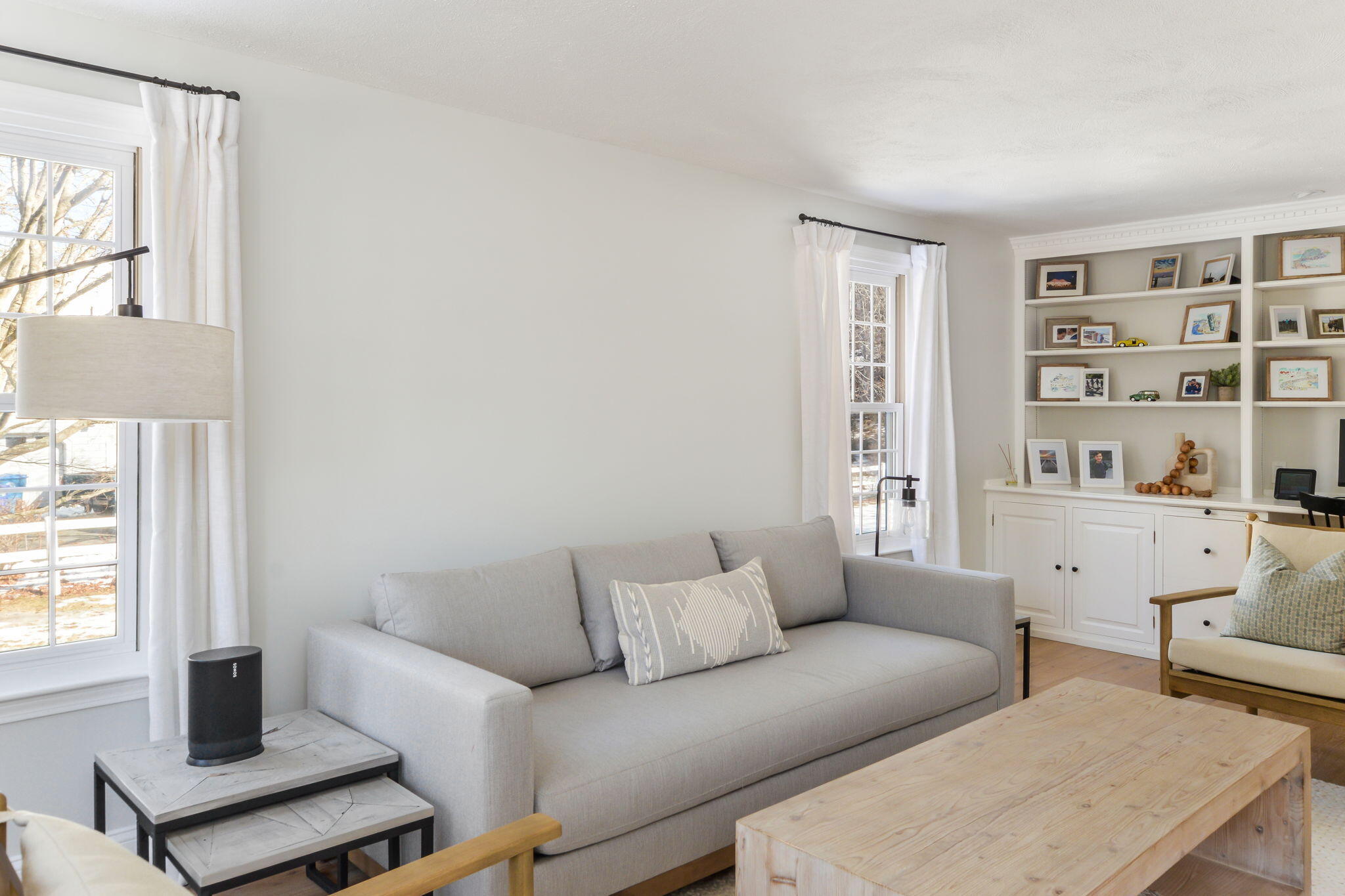 15 Marvin Circle Falmouth, MA 02540 - Photo 8 of 47 a living room with furniture and a book shelf