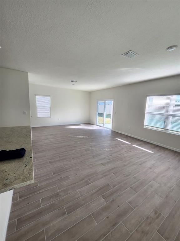 5149 Southwest 48th Lane Gainesville, FL 32608 - Photo 4 of 16 a view of an empty room and window