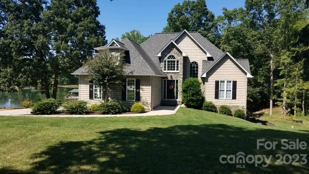 154 Harbor Point Drive Cherryville, NC 28021 - Photo 1 of 40 a front view of a house with a yard
