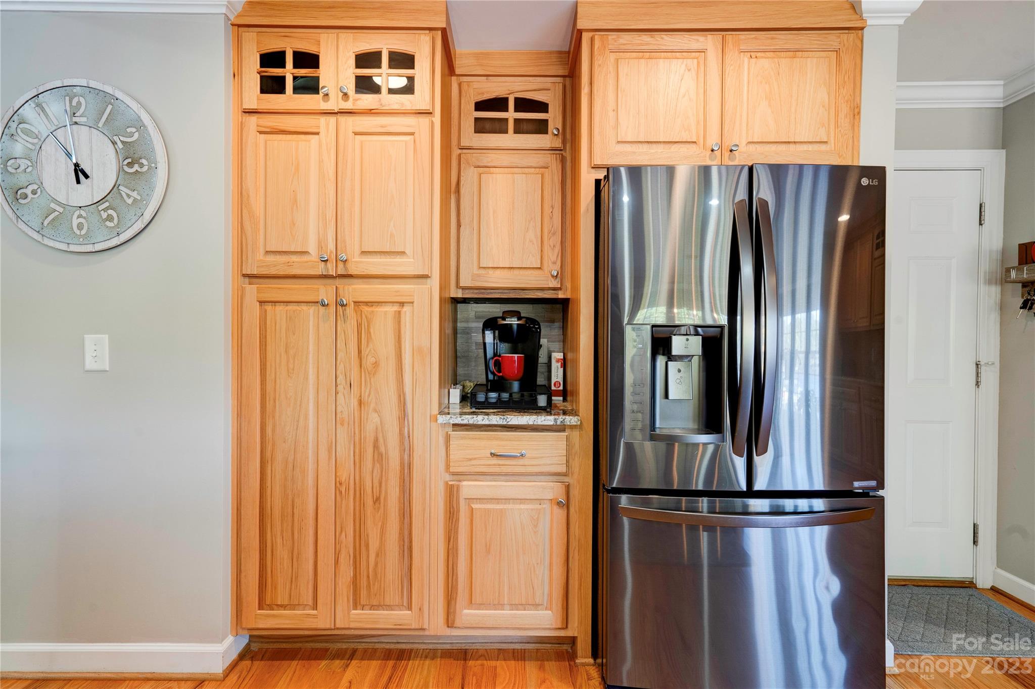 154 Harbor Point Drive Cherryville, NC 28021 - Photo 12 of 40 a view of a refrigerator with wooden floor