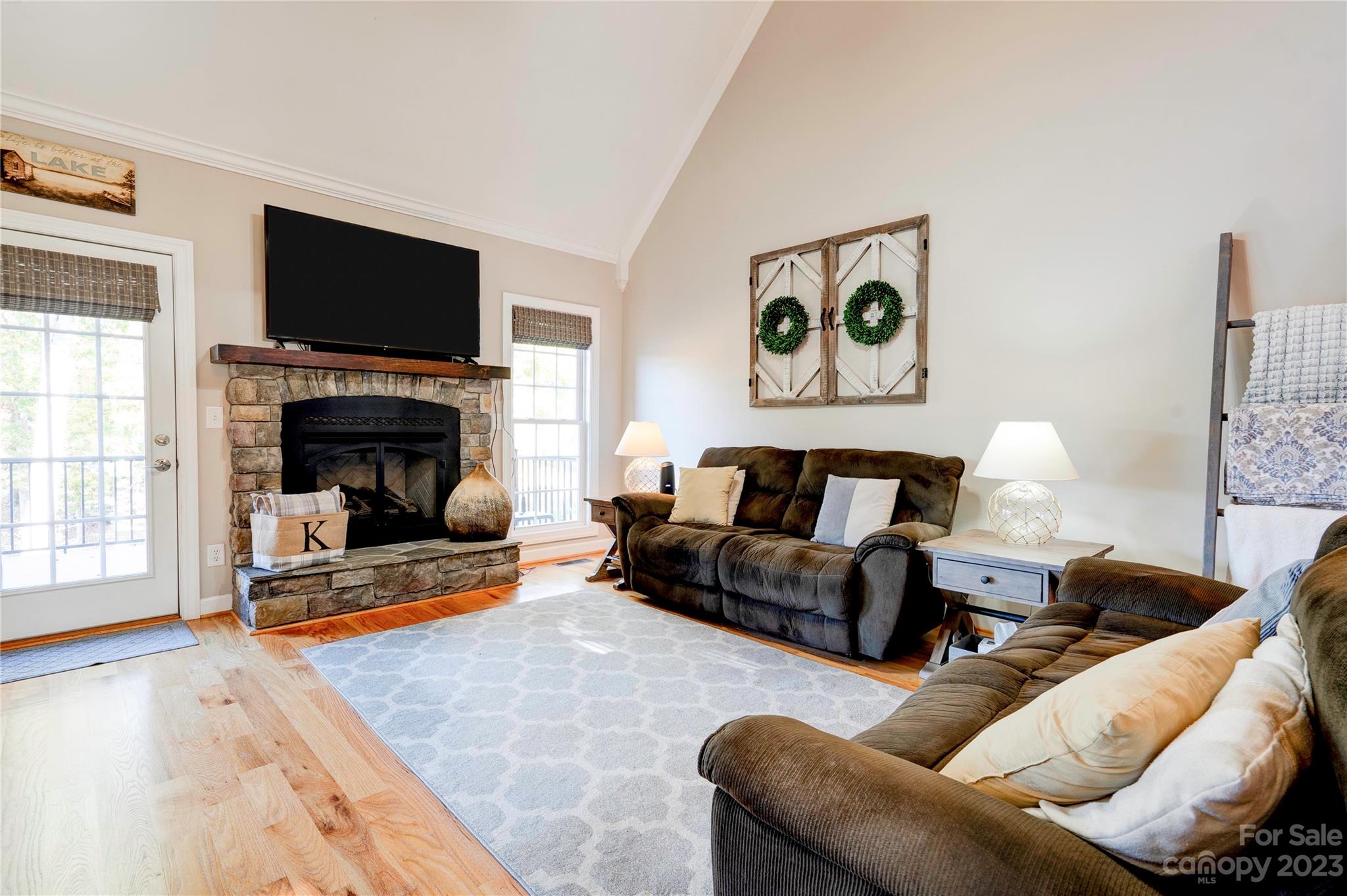 154 Harbor Point Drive Cherryville, NC 28021 - Photo 13 of 40 a living room with furniture and a fireplace