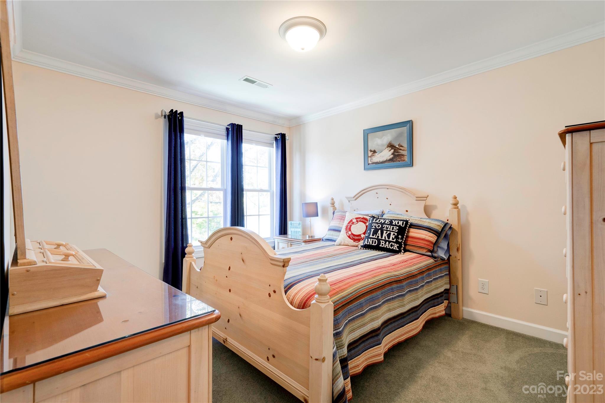 154 Harbor Point Drive Cherryville, NC 28021 - Photo 20 of 40 a bedroom with a bed and a window