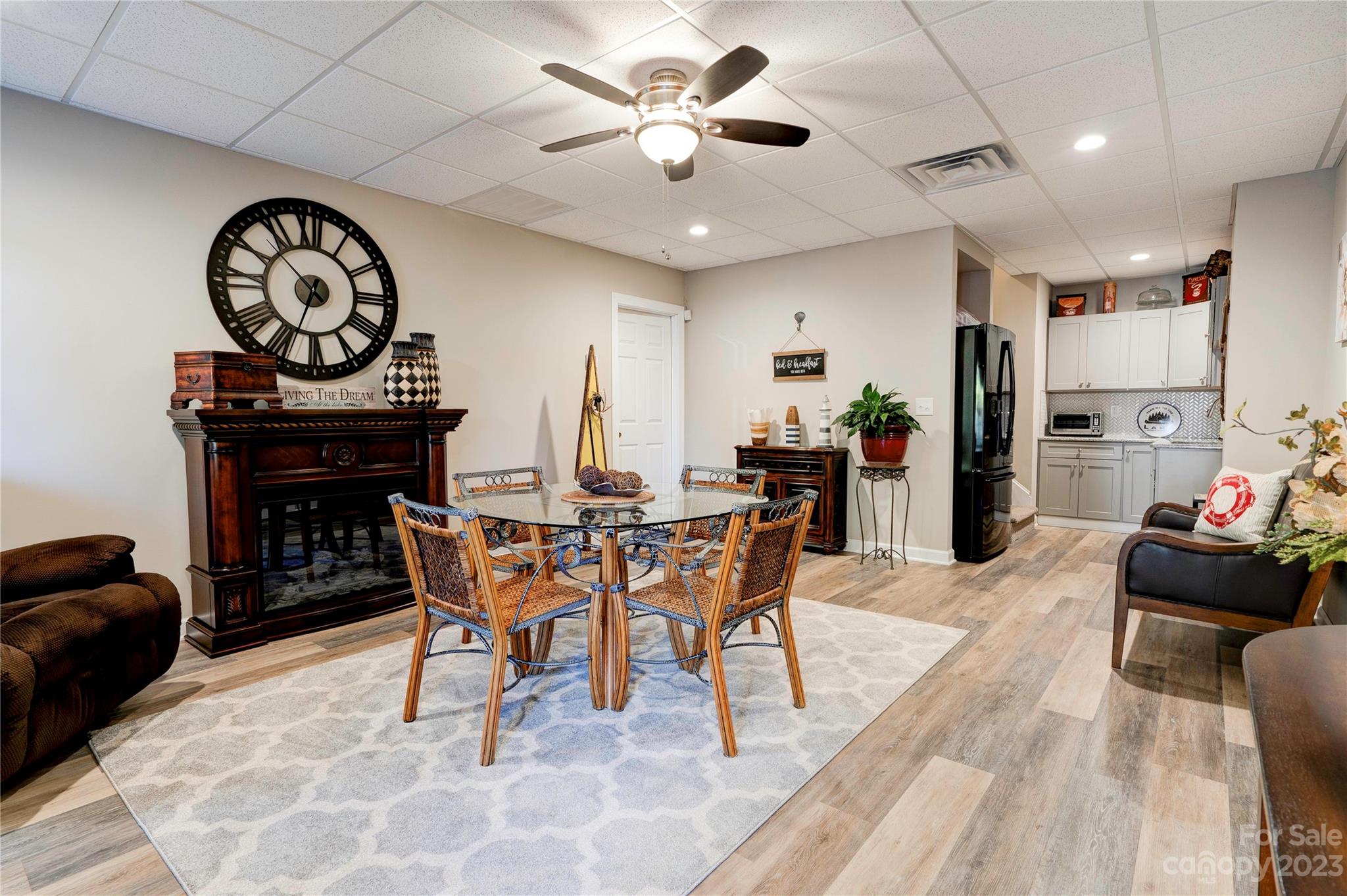154 Harbor Point Drive Cherryville, NC 28021 - Photo 23 of 40 a view of a dining room with furniture and a chandelier