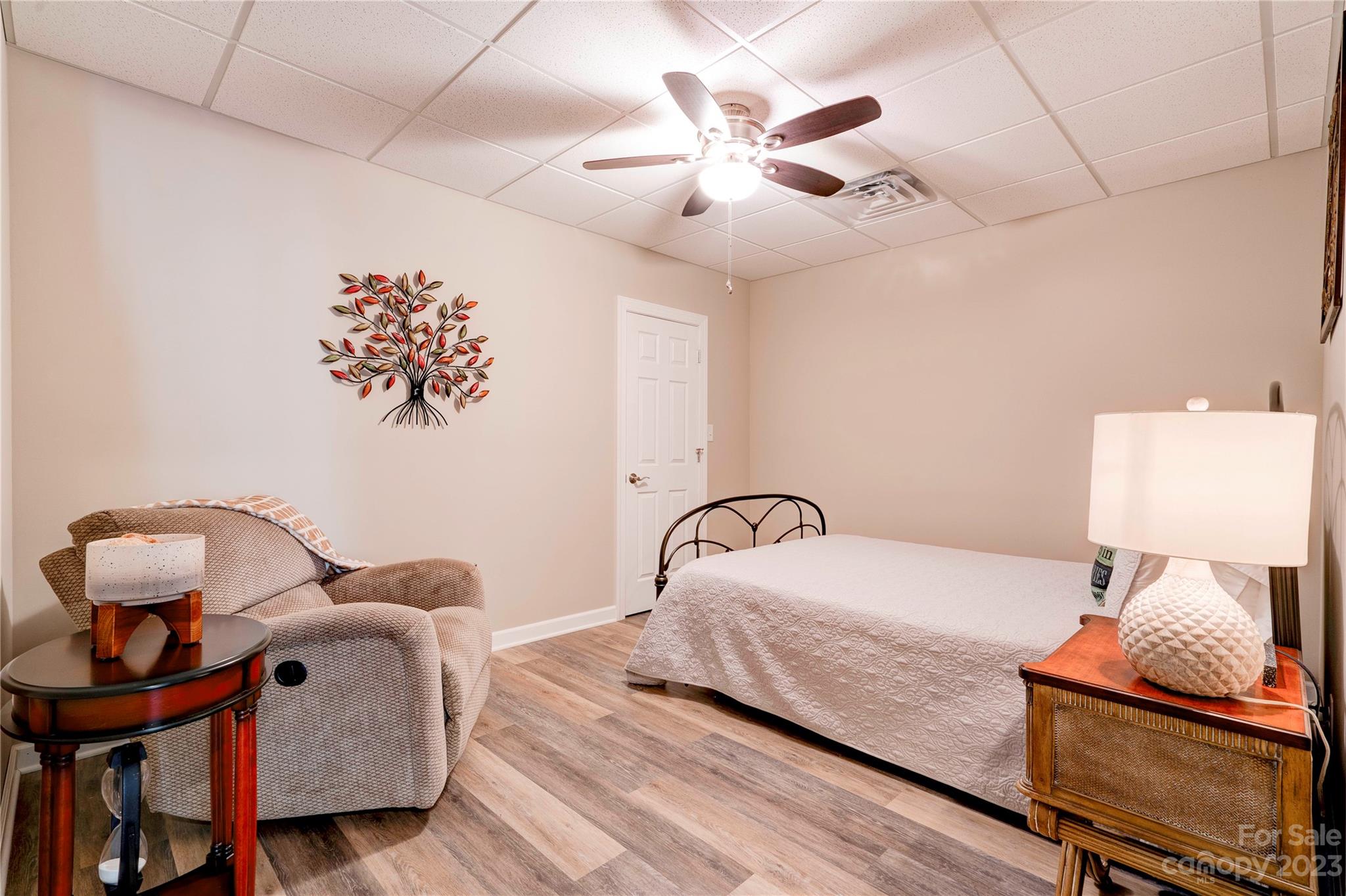 154 Harbor Point Drive Cherryville, NC 28021 - Photo 28 of 40 a bedroom with a bed and wooden floor