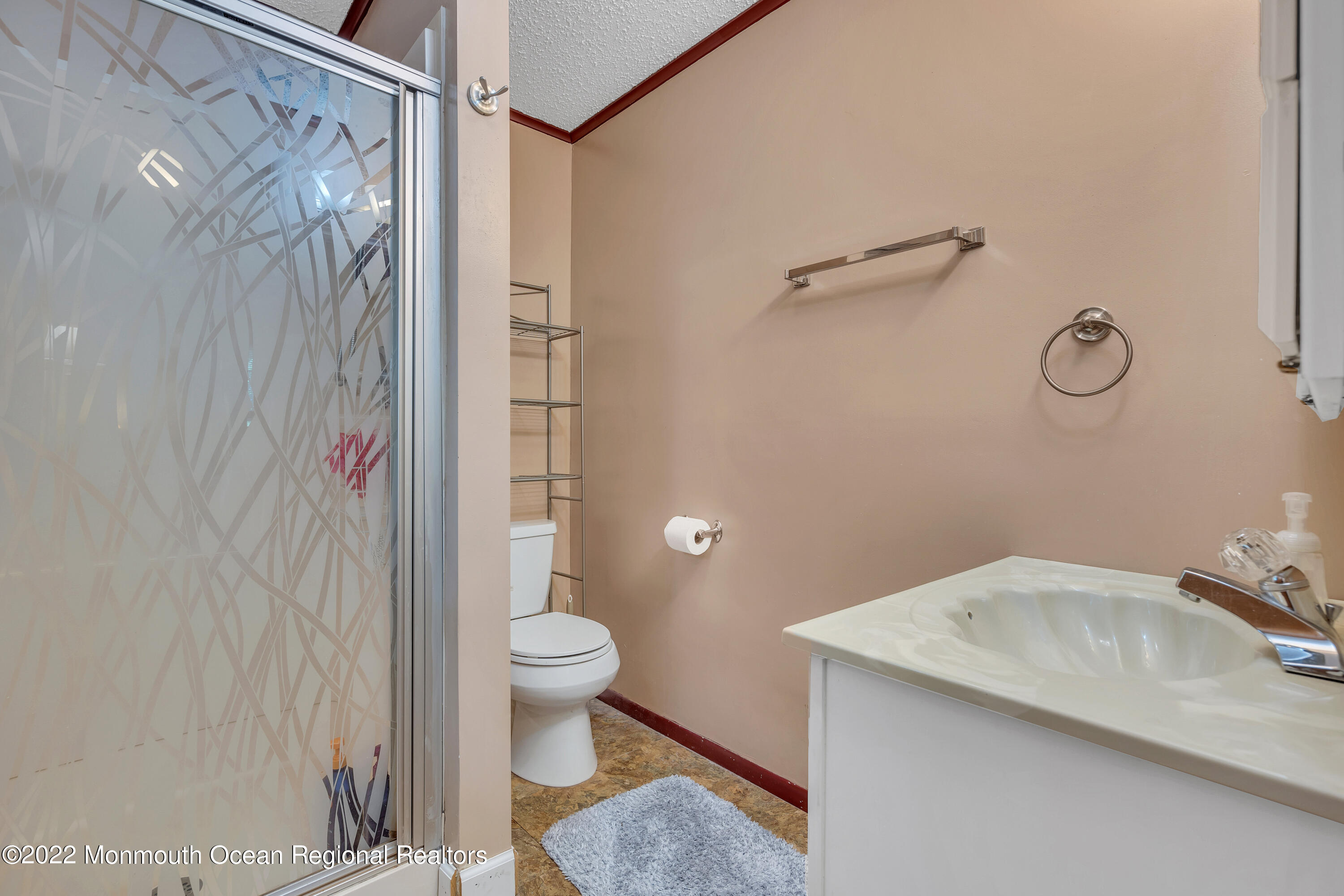 356 Cedar Swamp Road Jackson, NJ 08527 - Photo 26 of 56 a bathroom with a granite countertop sink toilet and shower