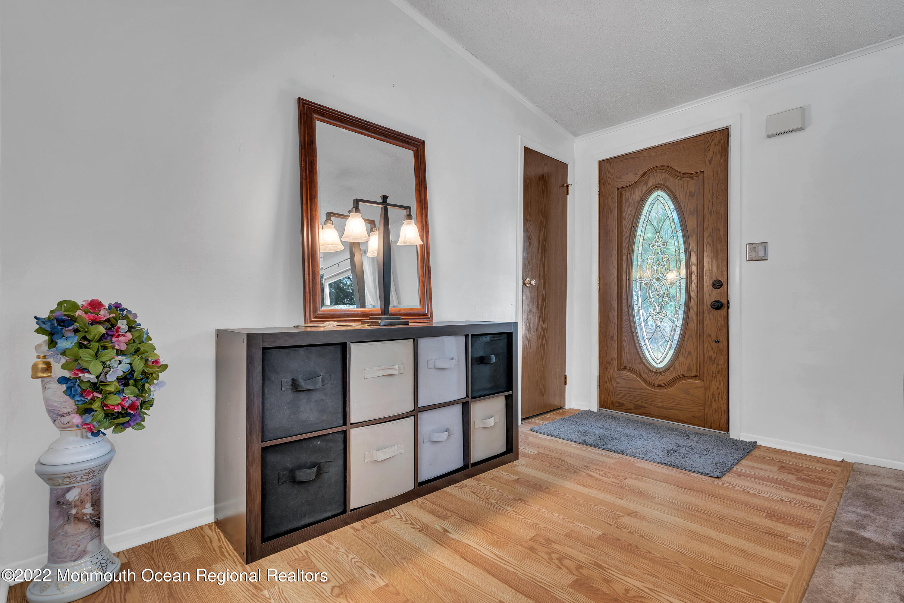 356 Cedar Swamp Road Jackson, NJ 08527 - Photo 3 of 56 a view of an entryway with wooden floor