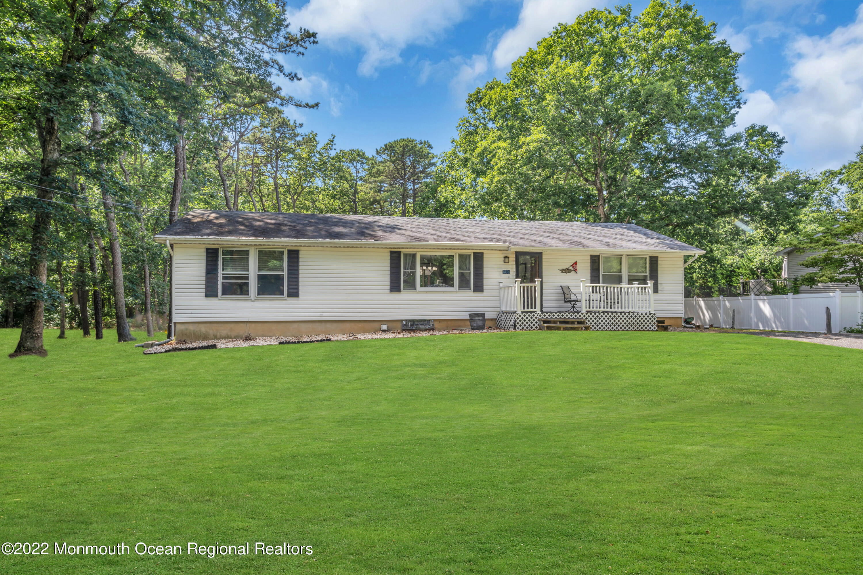 356 Cedar Swamp Road Jackson, NJ 08527 - Photo 34 of 56 a view of a house with a backyard