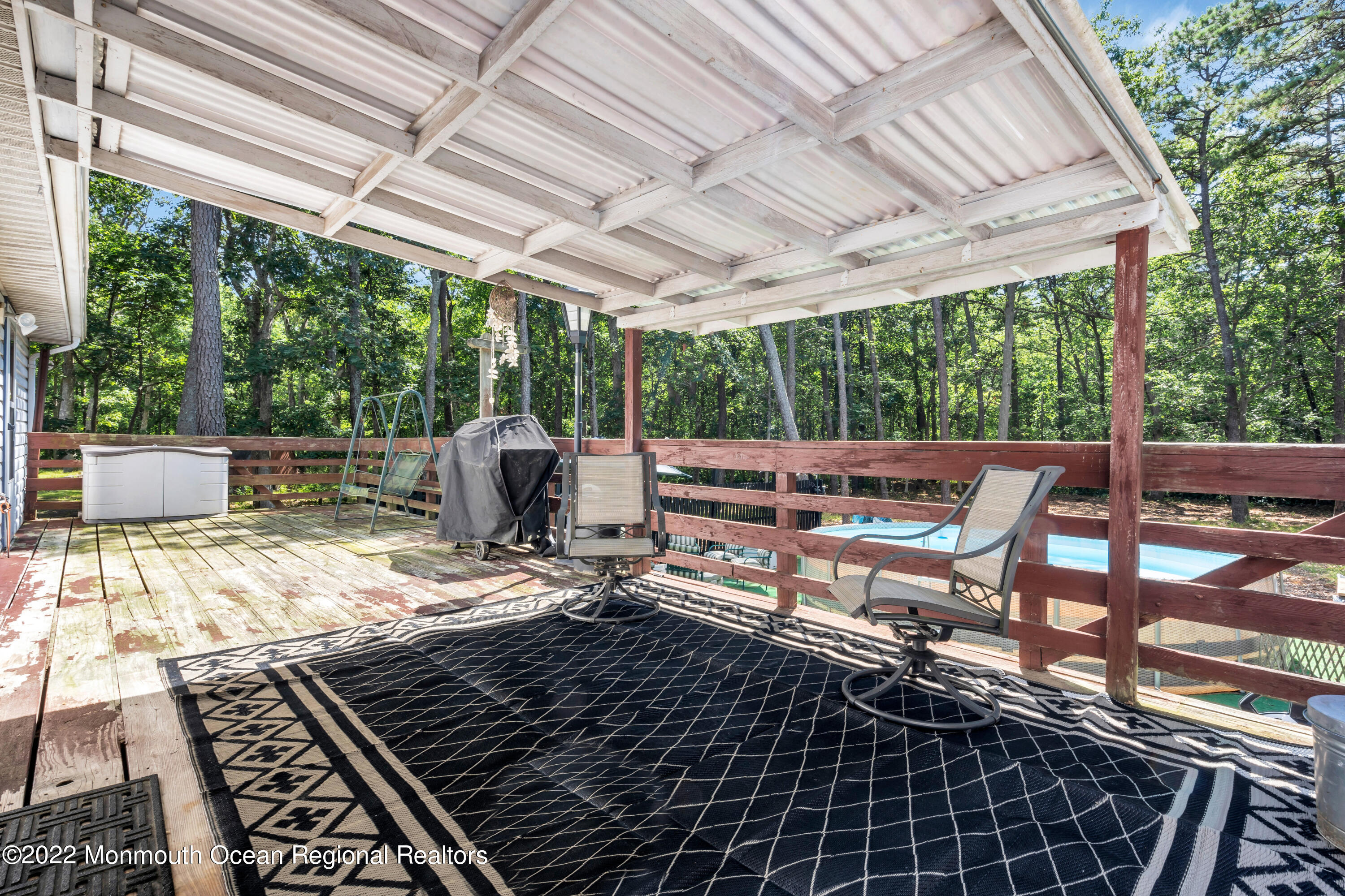 356 Cedar Swamp Road Jackson, NJ 08527 - Photo 44 of 56 a view of a backyard with sitting area
