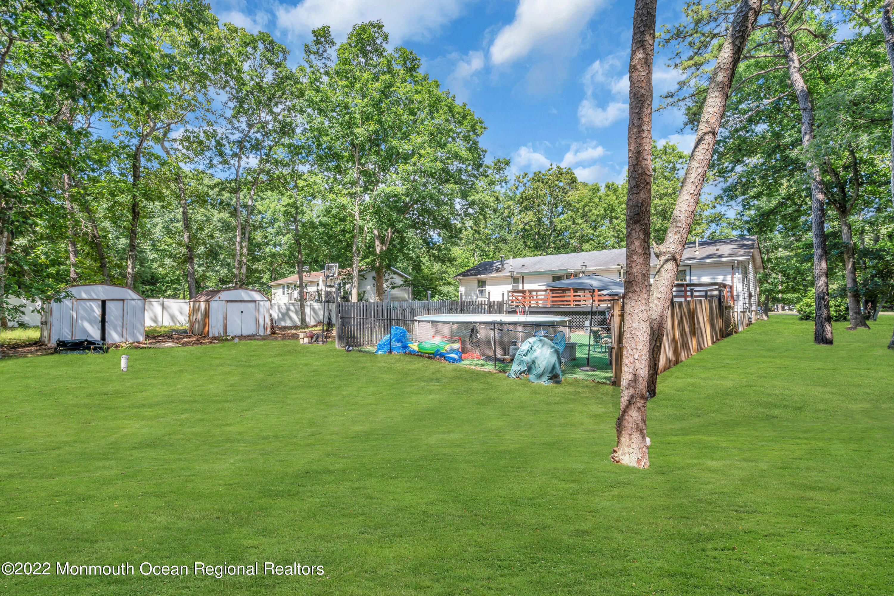 356 Cedar Swamp Road Jackson, NJ 08527 - Photo 52 of 56 a view of a garden with a house