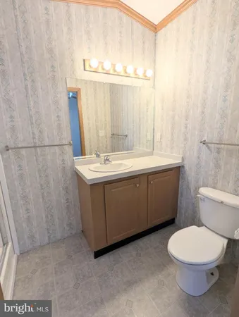 a room with a sink and a toilet