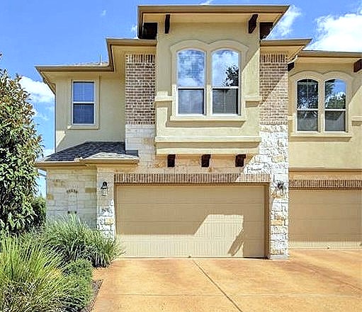 14001 Avery Ranch Boulevard, Unit 801 Austin, TX 78717 - Photo 1 of 26 A striking facade with varied textures and thoughtful design elements creates welcoming curb appeal.