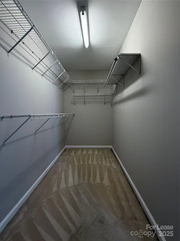 a view of a room with racks on the wall