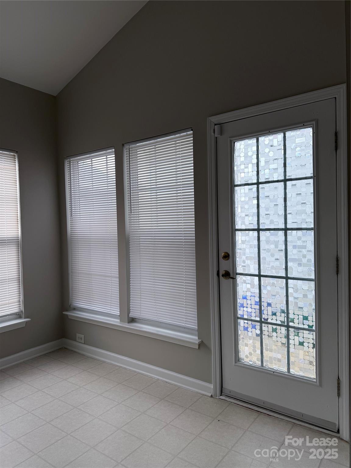 4968 Prosperity Ridge Road Charlotte, NC 28269 - Photo 14 of 19 an empty room with windows