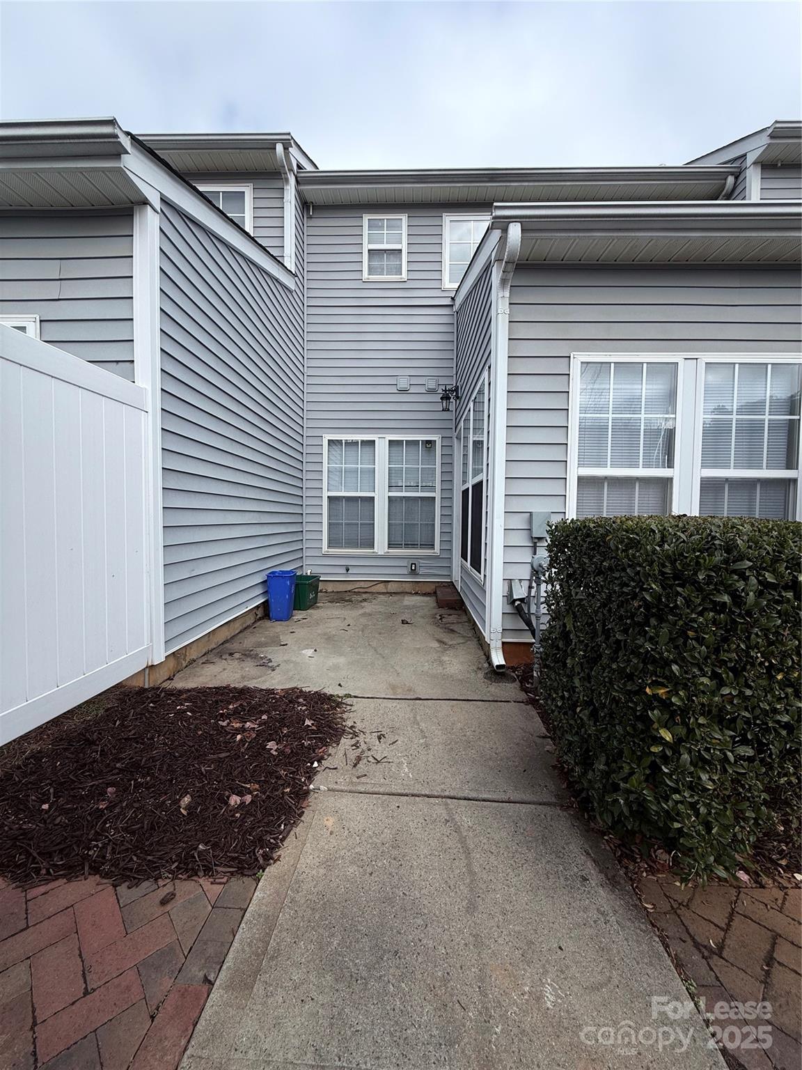 4968 Prosperity Ridge Road Charlotte, NC 28269 - Photo 15 of 19 a view of a house with a yard