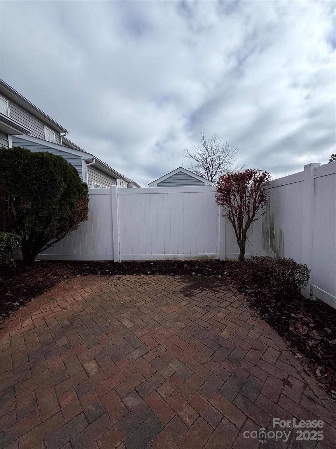 4968 Prosperity Ridge Road Charlotte, NC 28269 - Photo 16 of 19 a view of a backyard