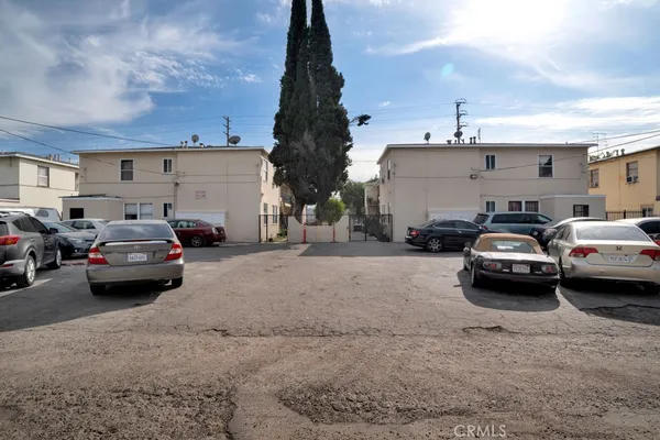 a car parked in parking lot of a building