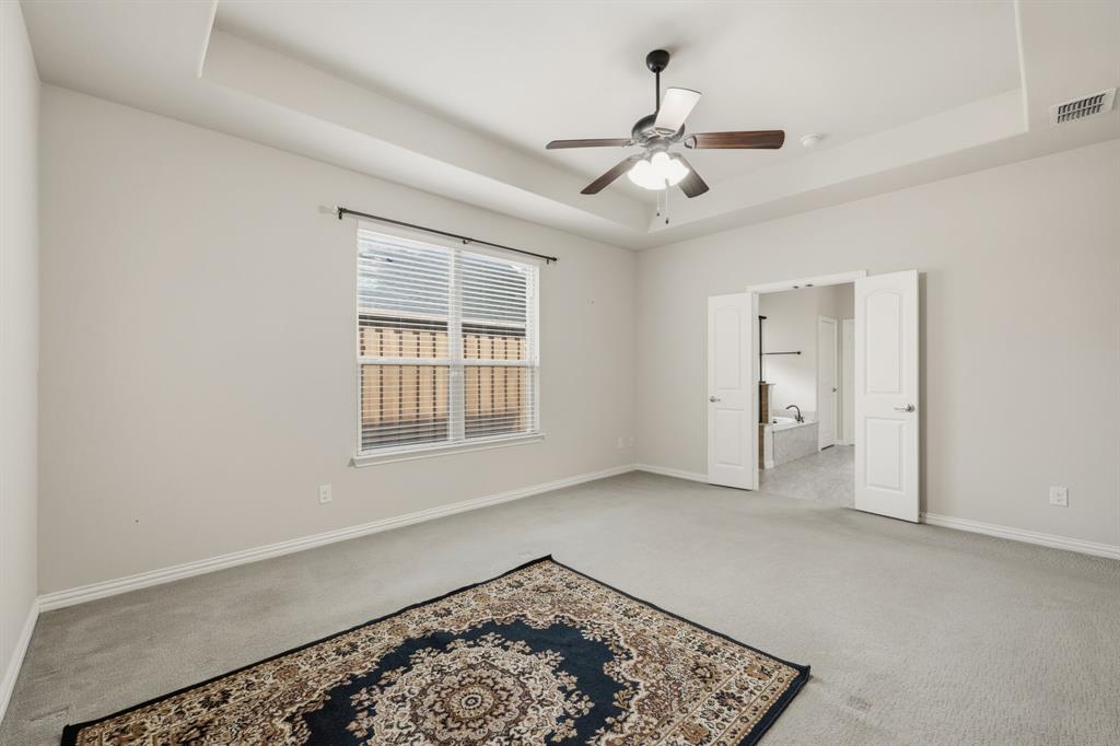 12809 Spring Hill Drive Frisco, TX 75035 - Photo 25 of 37 a view of an empty room with a window