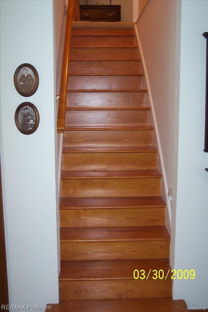 4740 Crooked Lake Road Howell, MI 48843 - Photo 17 of 21 oak staircase