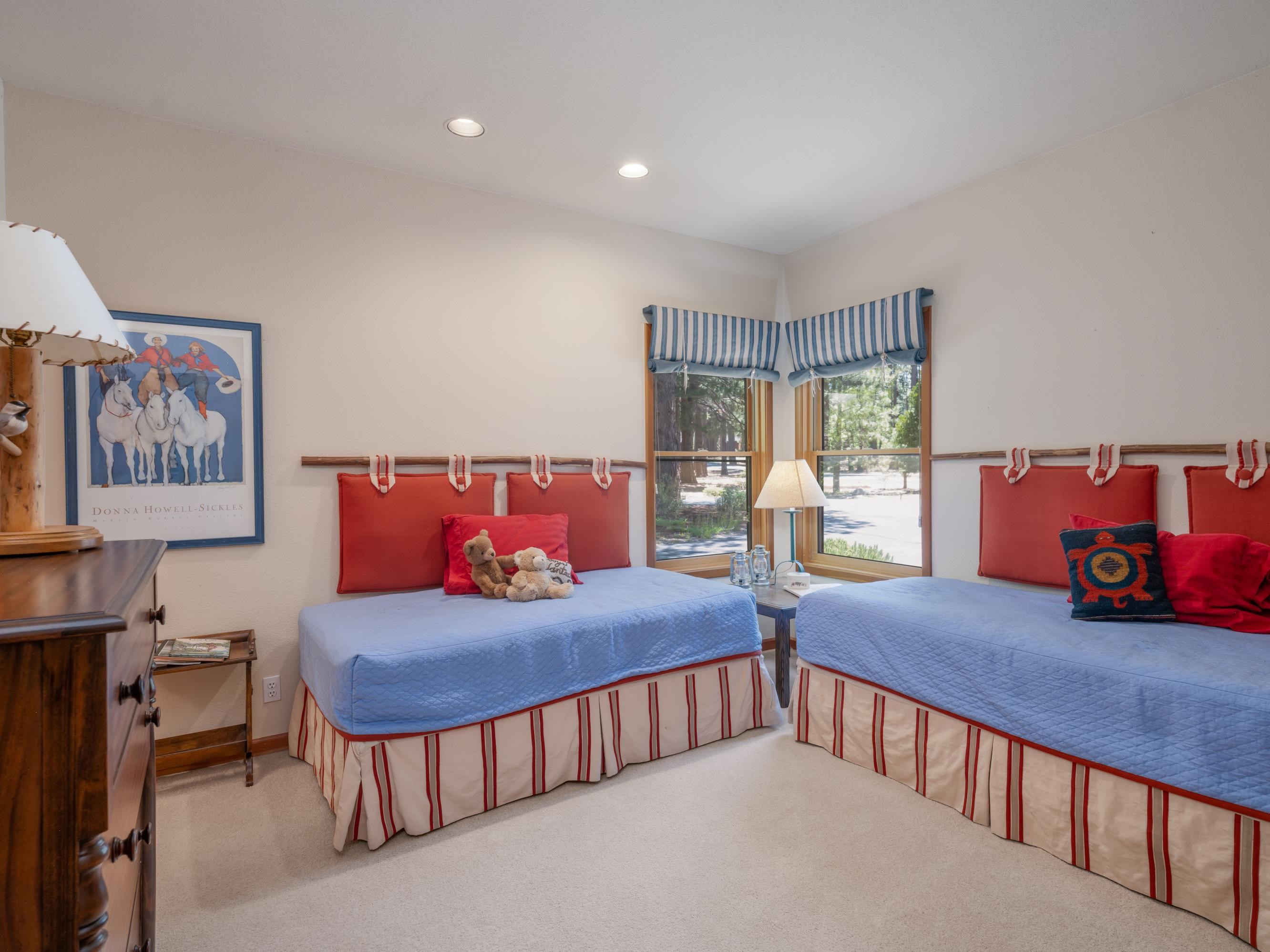 134 Quail View Circle Clio, CA 96106 - Photo 24 of 49 a bedroom with furniture and a large window