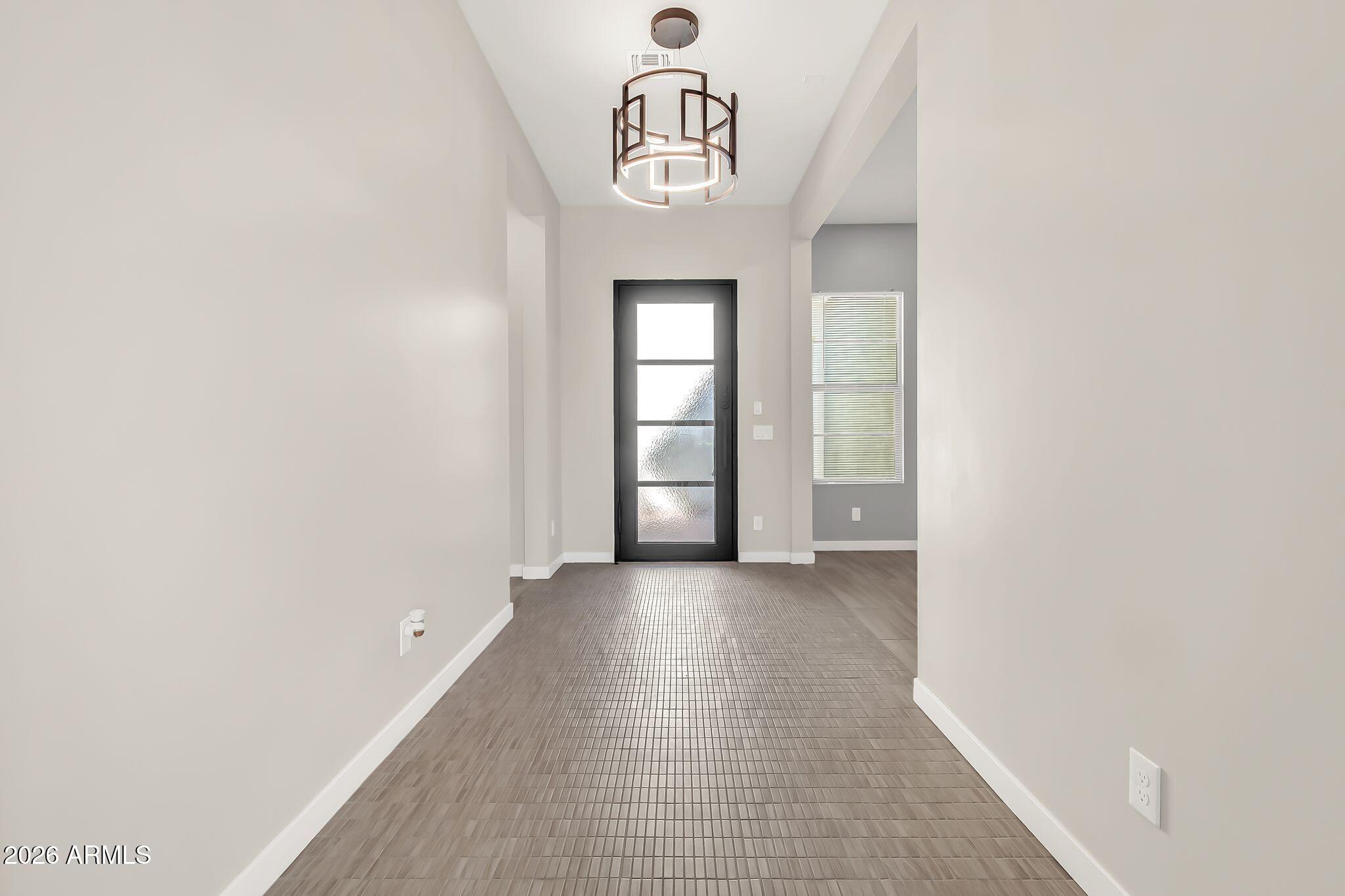 1441 East Powell Way Gilbert, AZ 85298 - Photo 37 of 63 a view of a hallway with a window