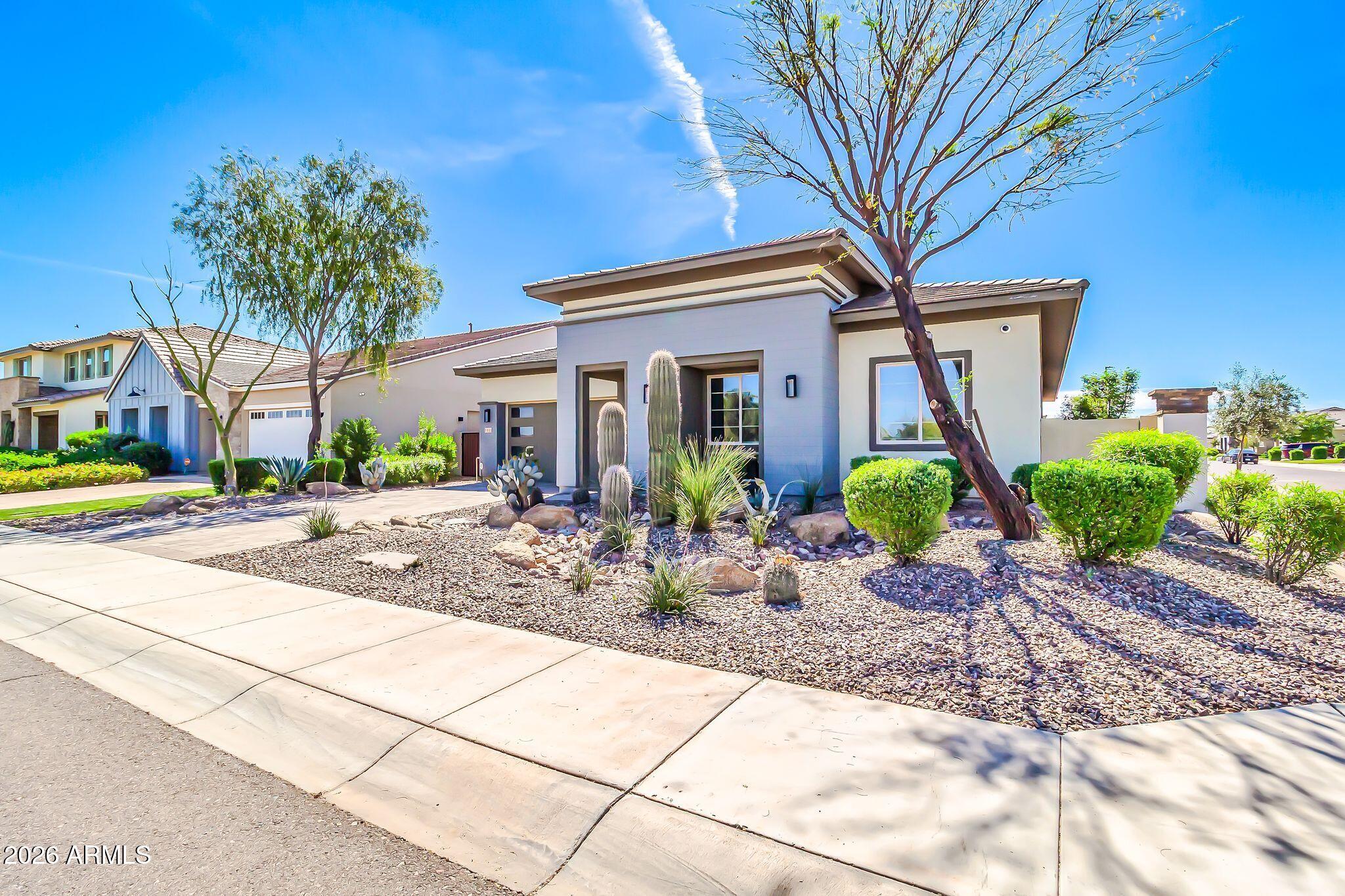 1441 East Powell Way Gilbert, AZ 85298 - Photo 3 of 63 a view of a house with a patio