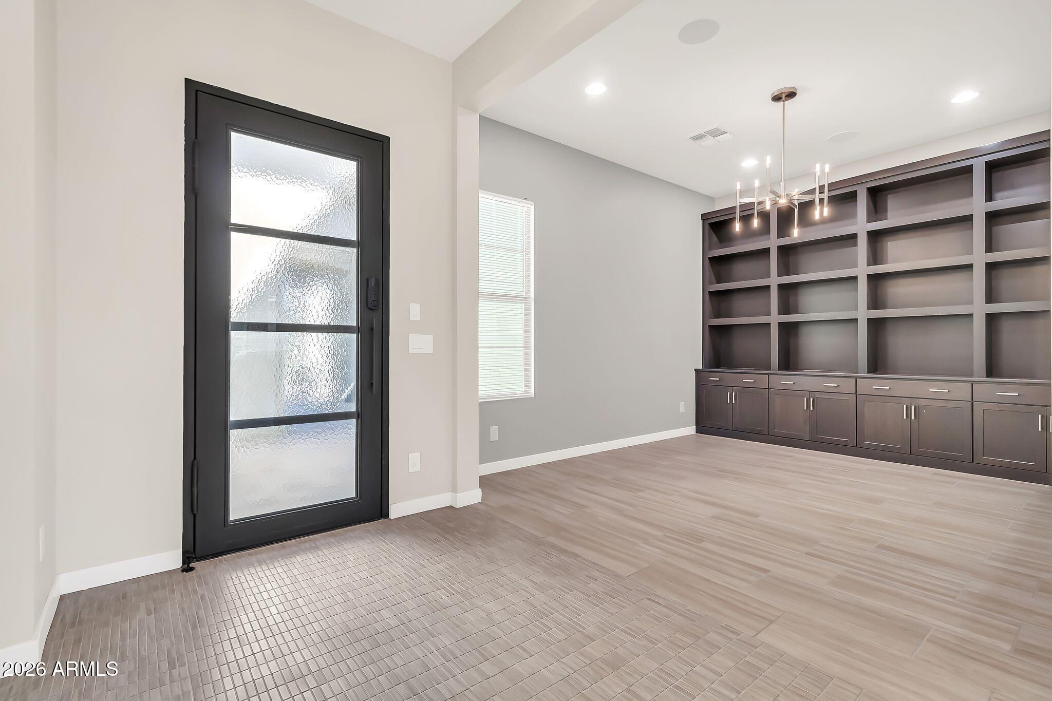 1441 East Powell Way Gilbert, AZ 85298 - Photo 40 of 63 a view of an empty room with a window