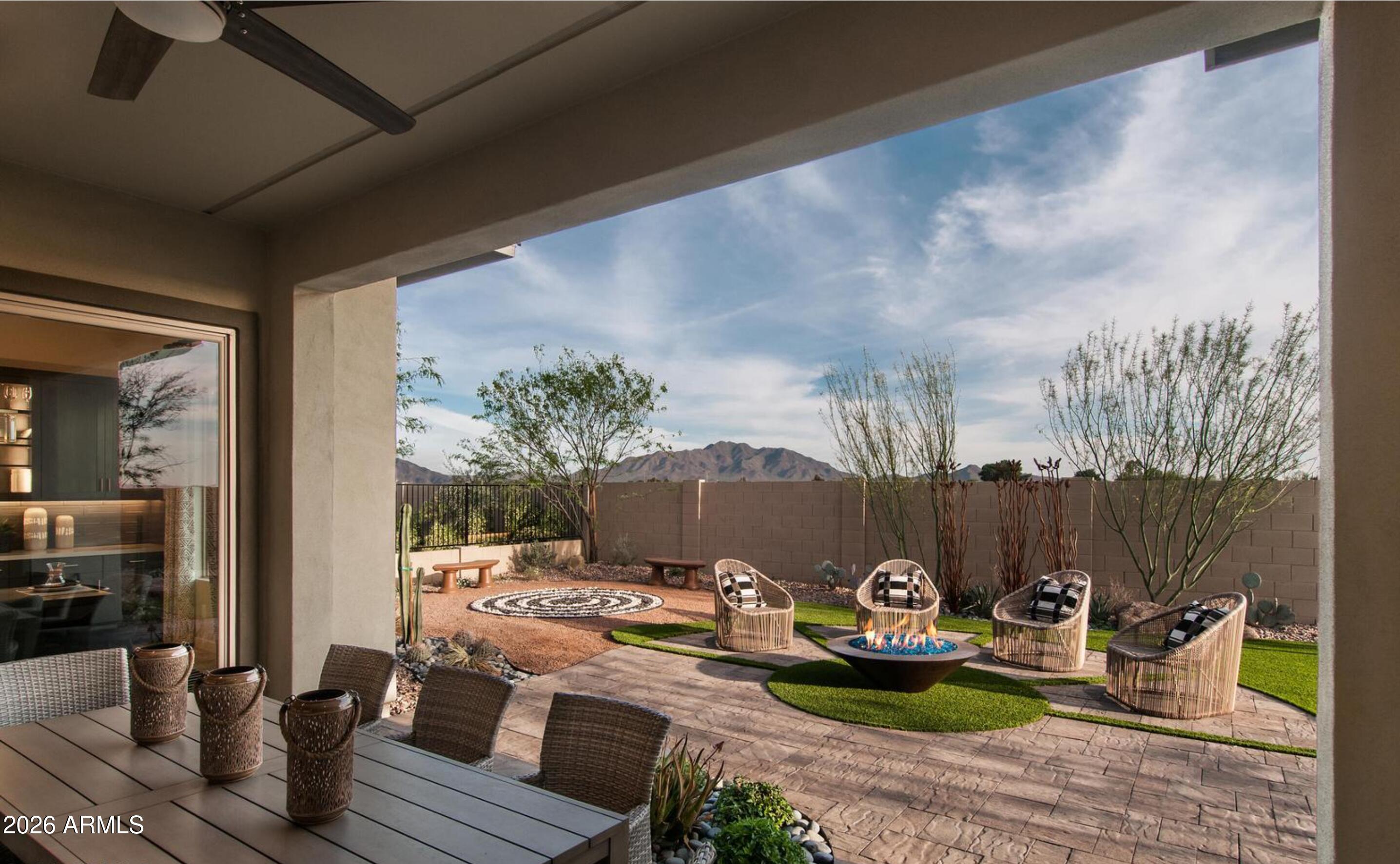 1441 East Powell Way Gilbert, AZ 85298 - Photo 49 of 63 a view of a backyard with sitting area