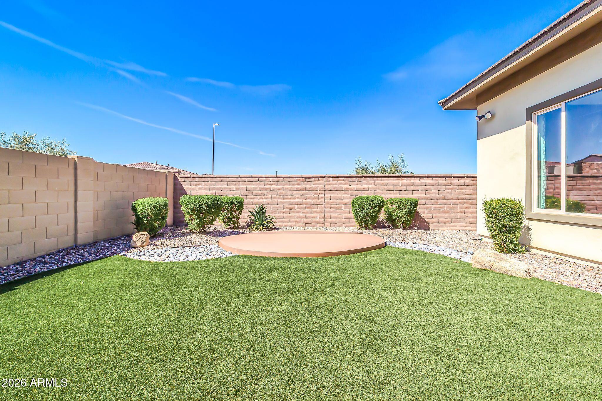 1441 East Powell Way Gilbert, AZ 85298 - Photo 57 of 63 a view of a back yard of the house