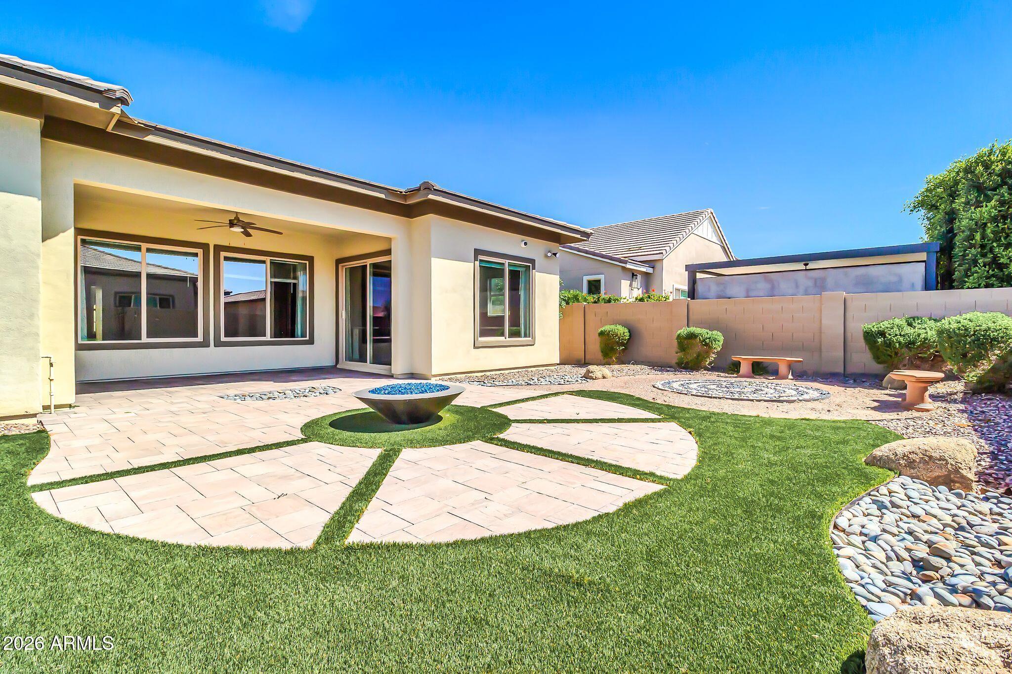 1441 East Powell Way Gilbert, AZ 85298 - Photo 58 of 63 front view of a house with a yard