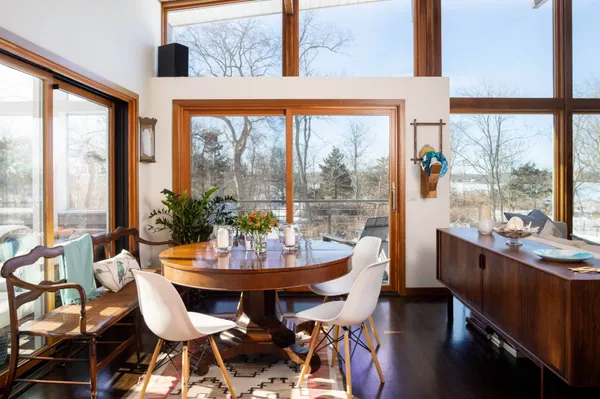 a view of a dining room with furniture window and outside view