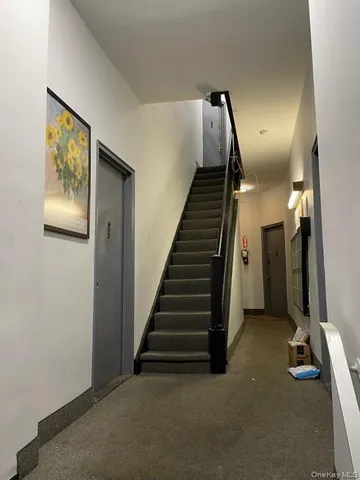 a view of a hallway with entryway