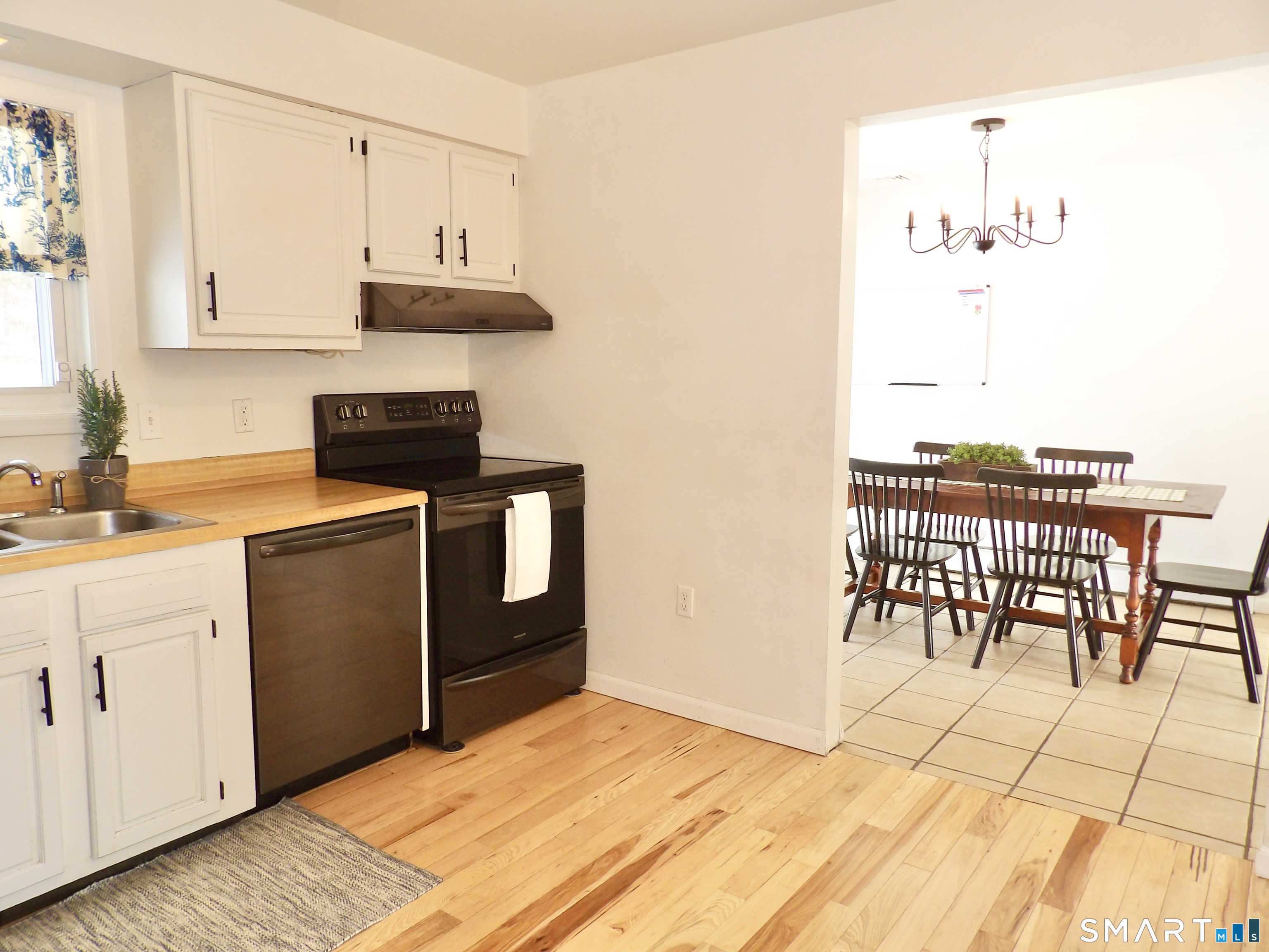 991 Shewville Road Ledyard, CT 06339 - Photo 12 of 29 Kitchen and Adjacent Dining Room