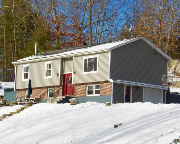 a front view of a house with a couch