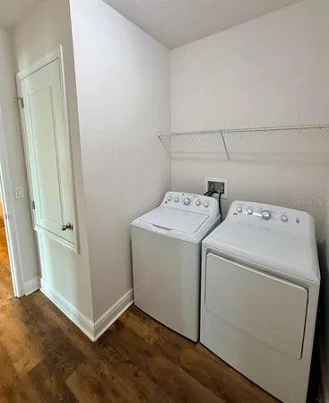 a utility room with dryer and washer
