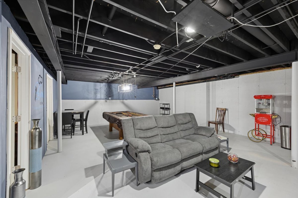 18311 Holland Road Lansing, IL 60438 - Photo 16 of 19 a living room with furniture and a ceiling fan