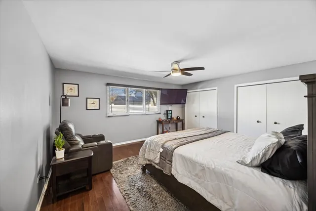 a bedroom with a bed furniture and a window