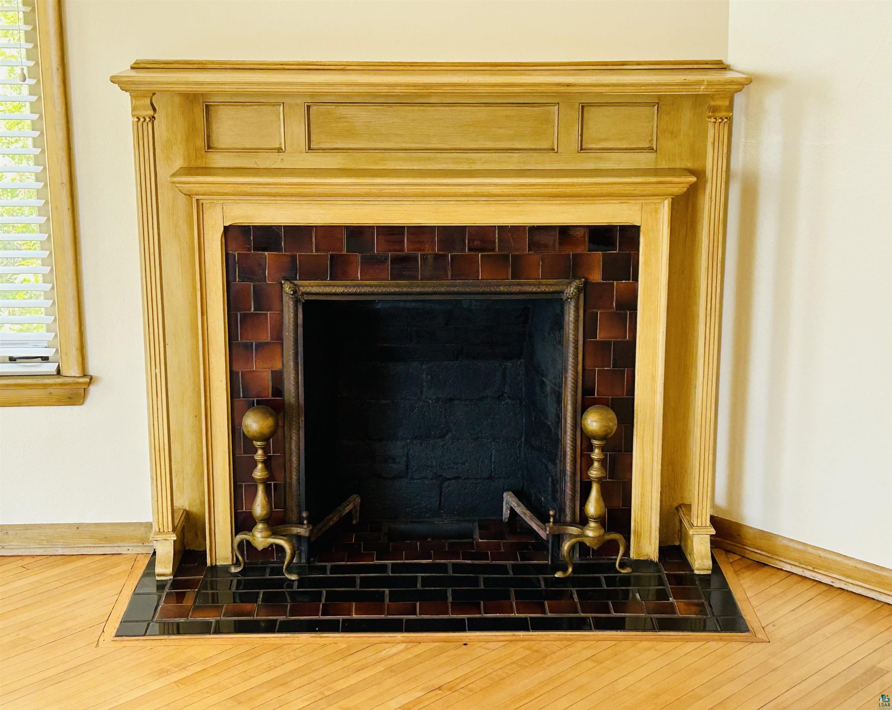 5090 London Road, Unit 1 Duluth, MN 55804 - Photo 19 of 54 Ornate wood-finish fireplace mantel featuring decorative fluting and paneling
