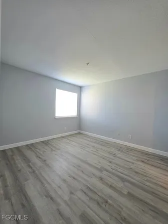 a view of an empty room and window