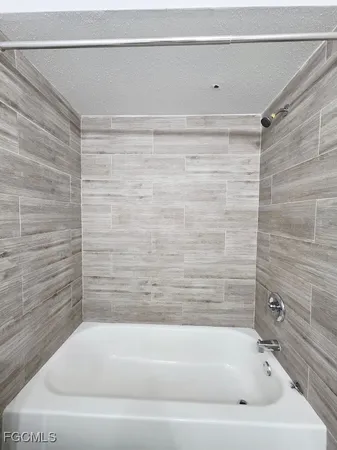 a bathroom with a bathtub