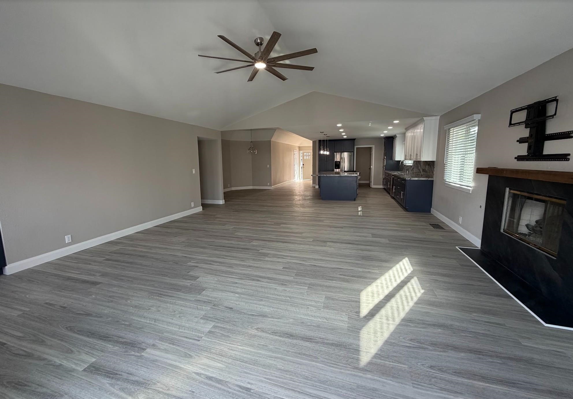 1958 Windward Point Discovery Bay, CA 94505 - Photo 6 of 12 a view of a living room a kitchen and a wooden floor