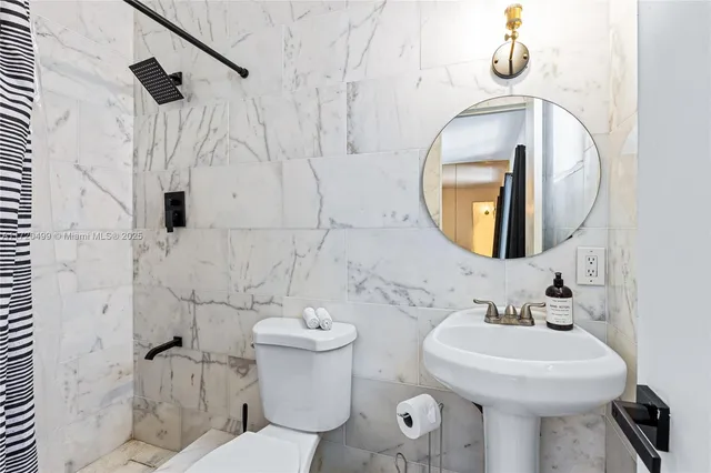 a view of a house with swimming pool and a sitting area